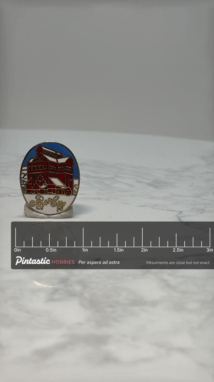 Park City Building Enamel Pin: Red & Blue Cloisonné - Vintage Souvenir Accessory with ruler overlay for size reference