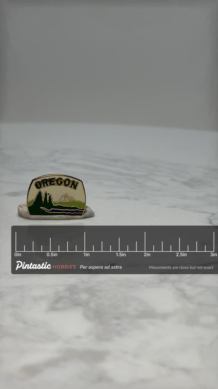 Oregon Souvenir Pin: Enamel Scenic Design - Vintage Travel Accessory with ruler overlay for size reference