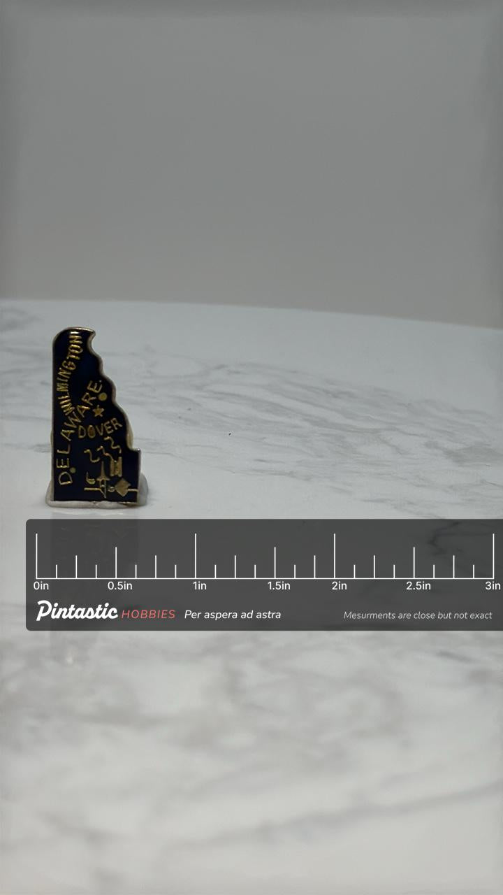 Delaware State Souvenir Pin: Gold Outline on Navy - Vintage Travel Accessory with ruler overlay for size reference