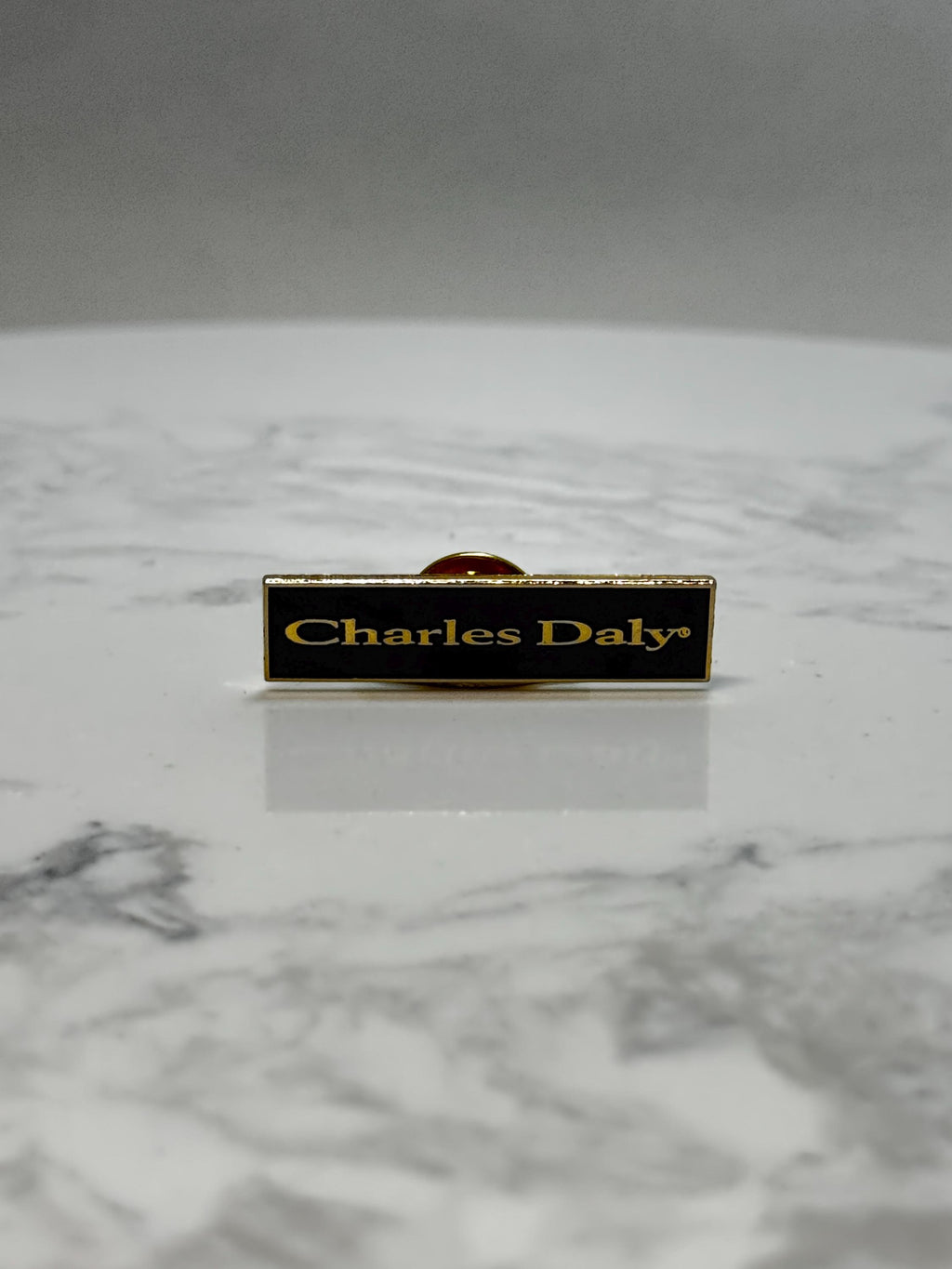 Charles Daly Nameplate Pin: Black & Gold Enamel - Vintage Accessory