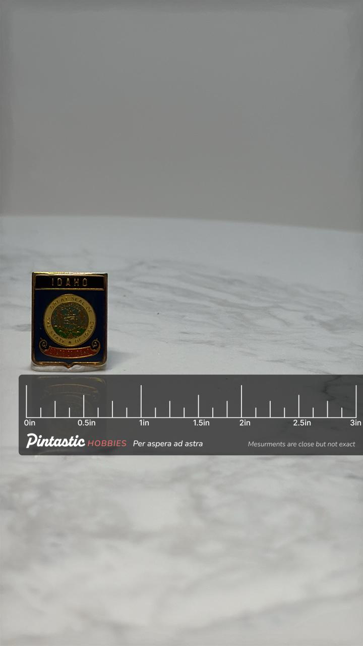 Idaho State Seal Pin: Red Blue Gold Enamel - Vintage Souvenir Accessory with ruler overlay for size reference