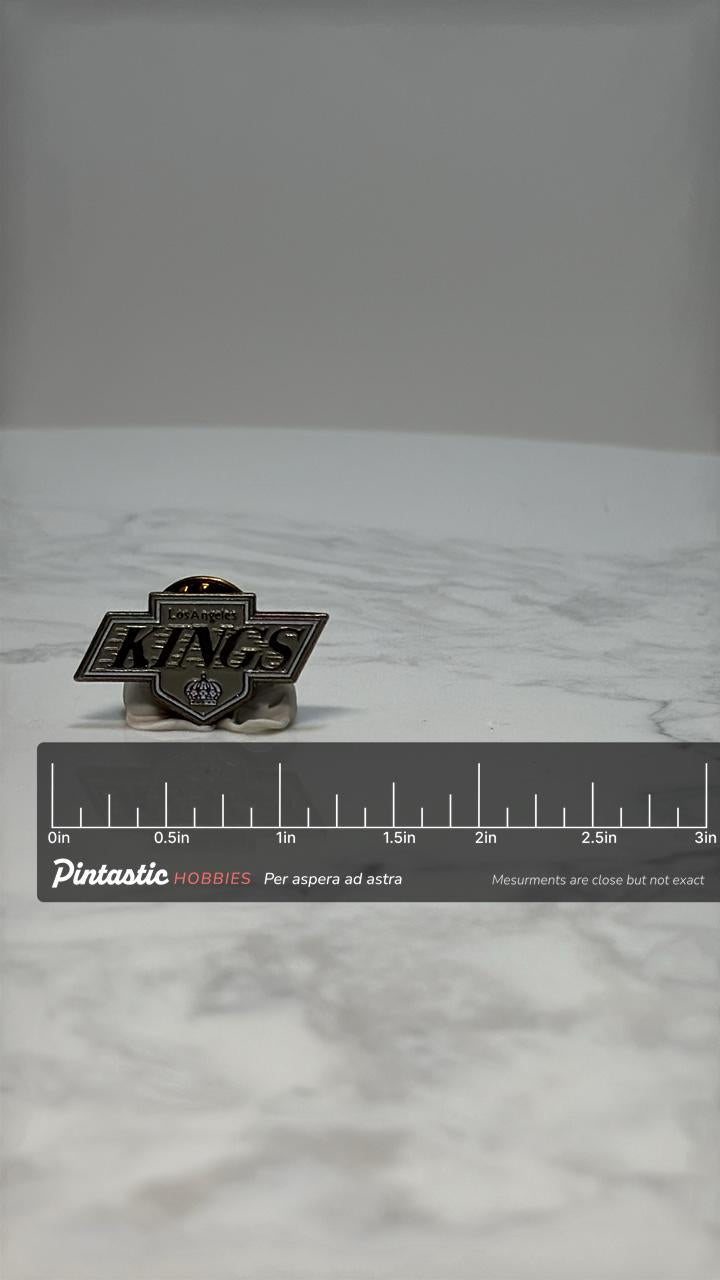 Los Angeles Kings Logo Pin: Silver-Tone Enamel - NHL Sports Accessory with ruler overlay for size reference
