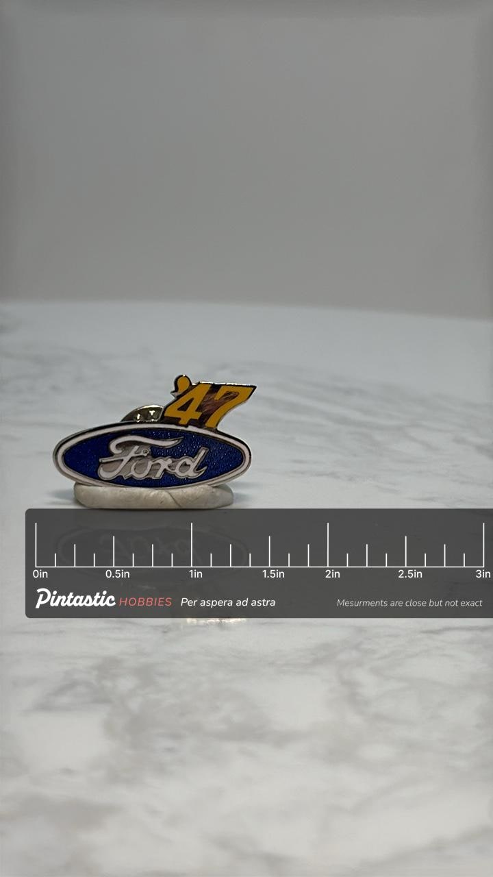 Ford '47 Logo Pin: Blue Oval & Yellow 47 - Vintage Auto Accessory with ruler overlay for size reference