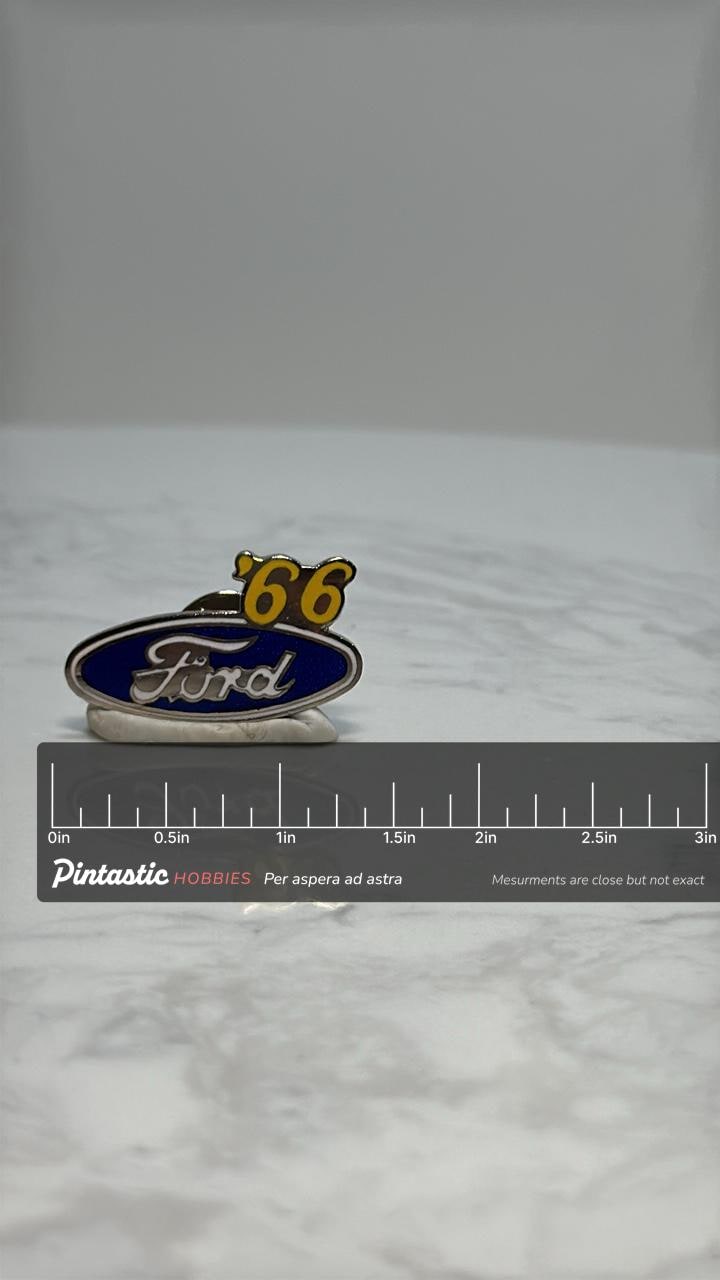 Ford '66 Logo Pin: Blue Enamel & Silver Tone - Vintage Auto Accessory with ruler overlay for size reference