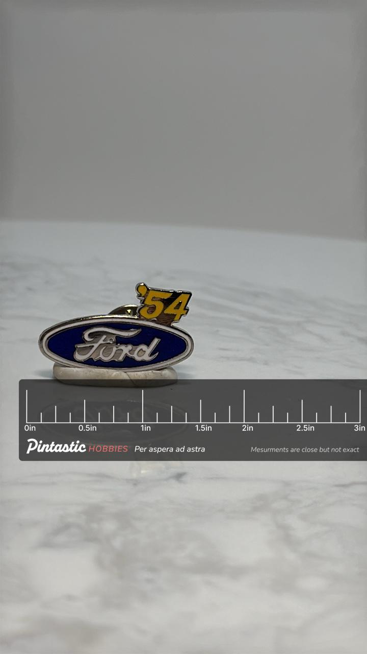 Ford '54 Logo Pin: Blue Enamel & Silver Tone - Vintage Auto Accessory with ruler overlay for size reference