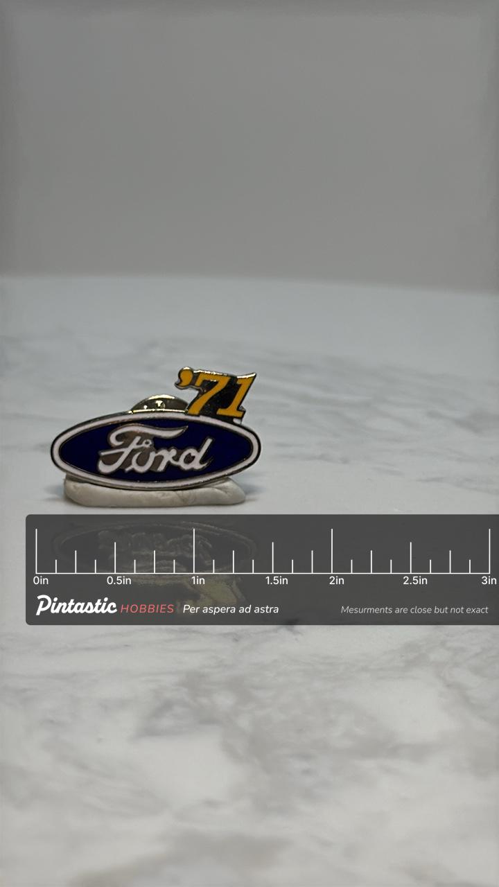 Ford '71 Logo Pin: Blue Enamel Finish - Vintage Auto Accessory with ruler overlay for size reference