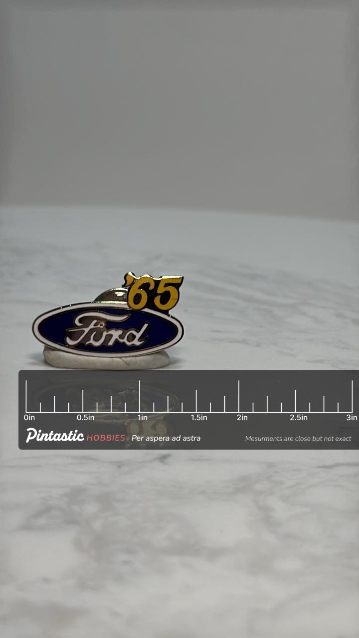 Ford '65 Logo Pin: Blue Enamel Lapel - Vintage Car Accessory with ruler overlay for size reference