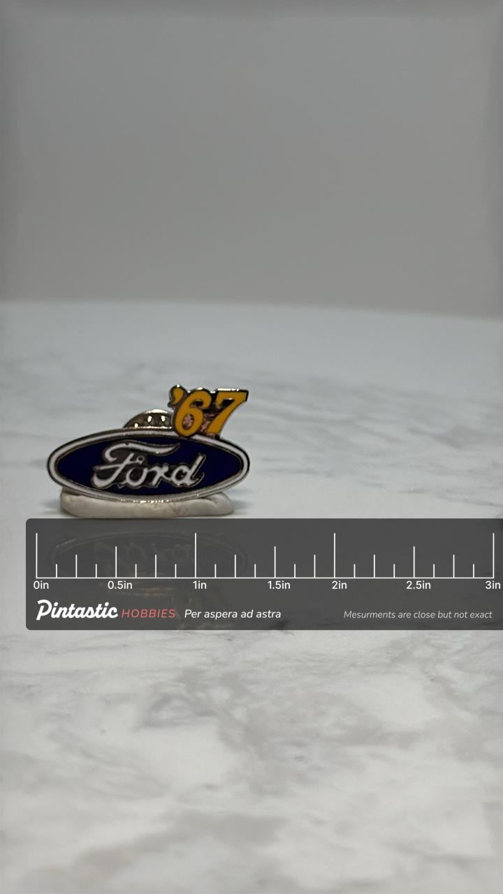Ford '67 Car Pin: Blue Enamel Oval - Vintage Auto Accessory with ruler overlay for size reference