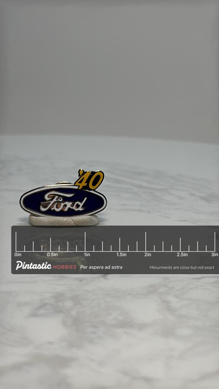 Ford '40 Car Logo Pin: Blue & Yellow Enamel - Vintage Auto Accessory with ruler overlay for size reference