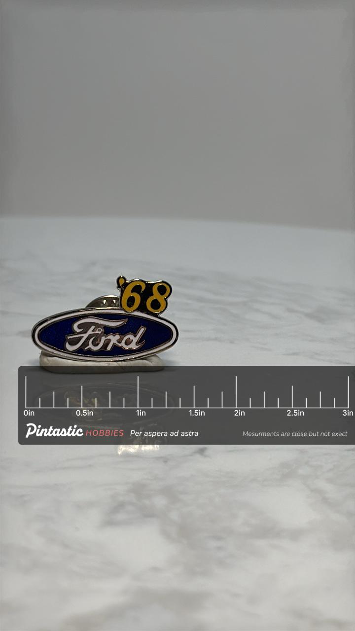 Ford '68 Enamel Pin: Blue & Yellow Finish - Vintage Auto Accessory with ruler overlay for size reference