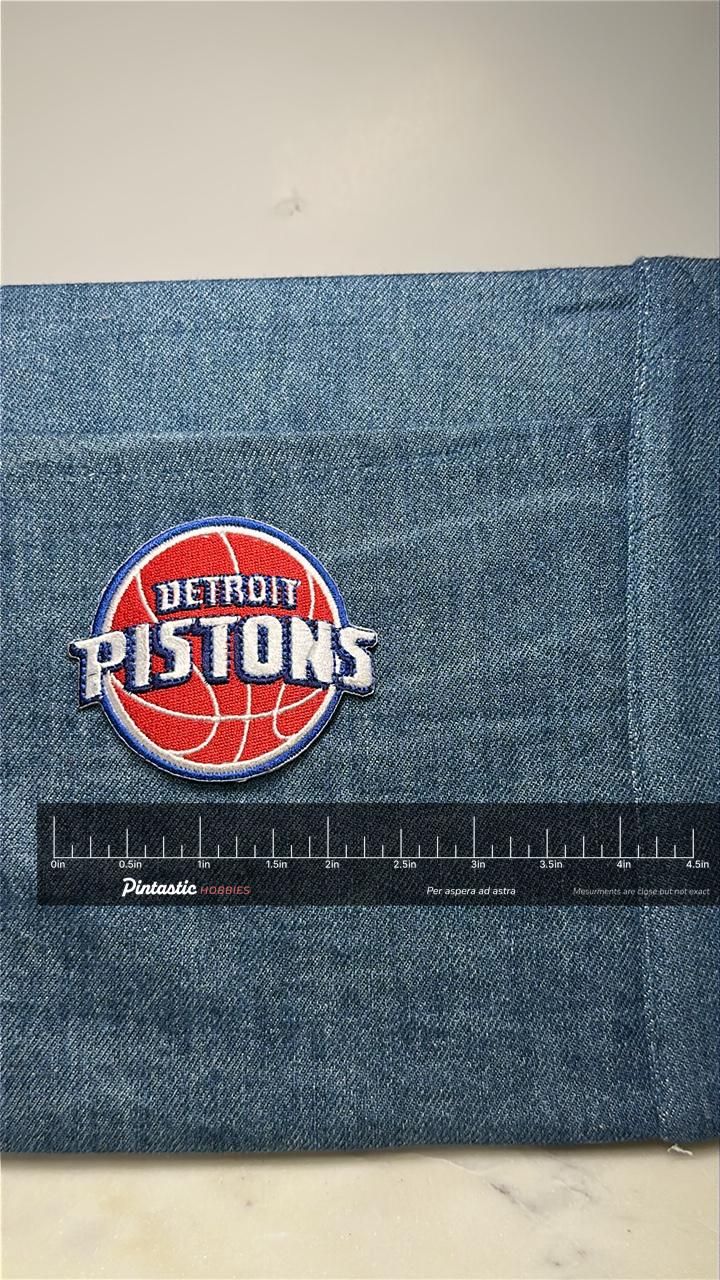 Detroit Pistons Collectable Patch: Red Blue White - Vintage Sports Accessory with ruler overlay for size reference