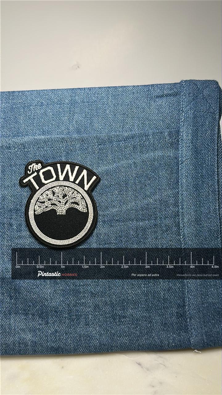 Golden State The Town Collectable Patch: Black & White Emblem - NBA Accessory with ruler overlay for size reference
