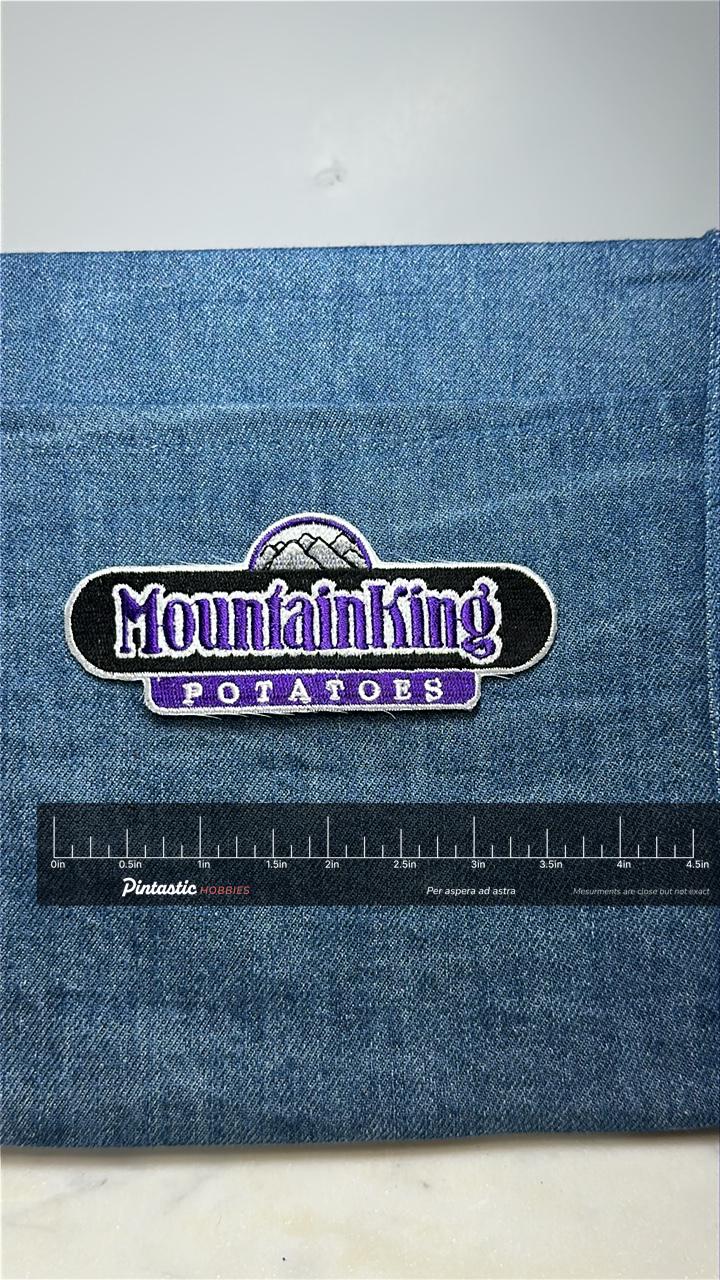 MountainKing Potatoes Collectable Patch: Black Purple Logo - Vintage Food Accessory with ruler overlay for size reference