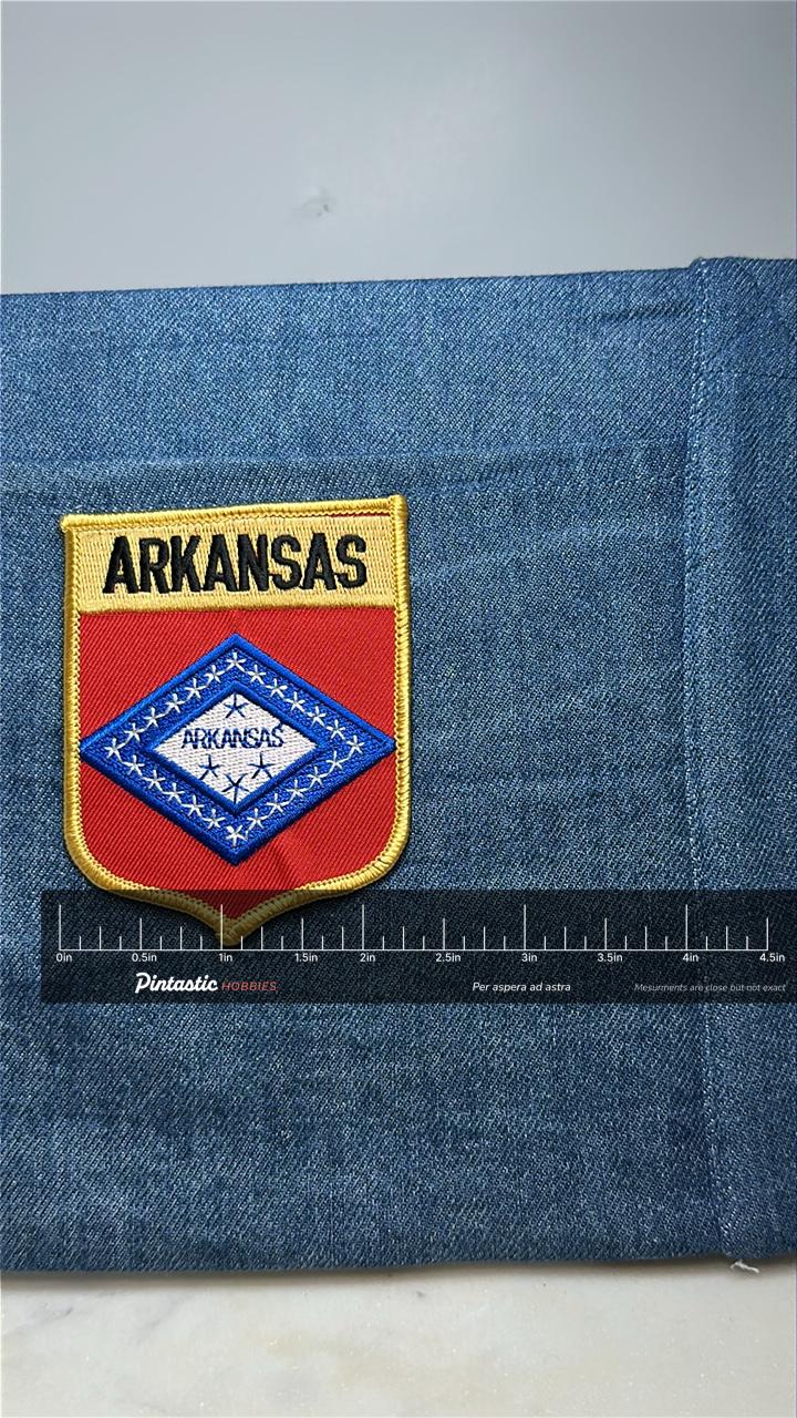 Arkansas Collectable Patch: Red Gold Shield Style - State Pride Accessory with ruler overlay for size reference