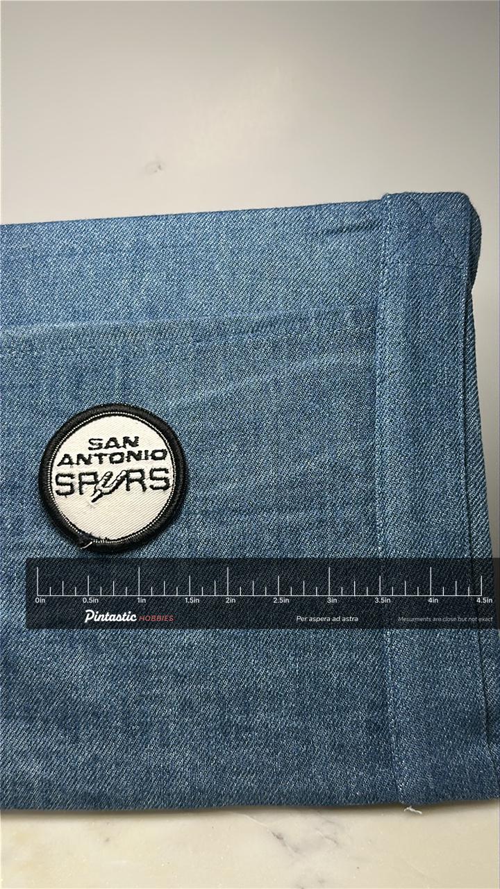 San Antonio Spurs Collectable Patch: Black & White Circle - Vintage Sports Accessory with ruler overlay for size reference