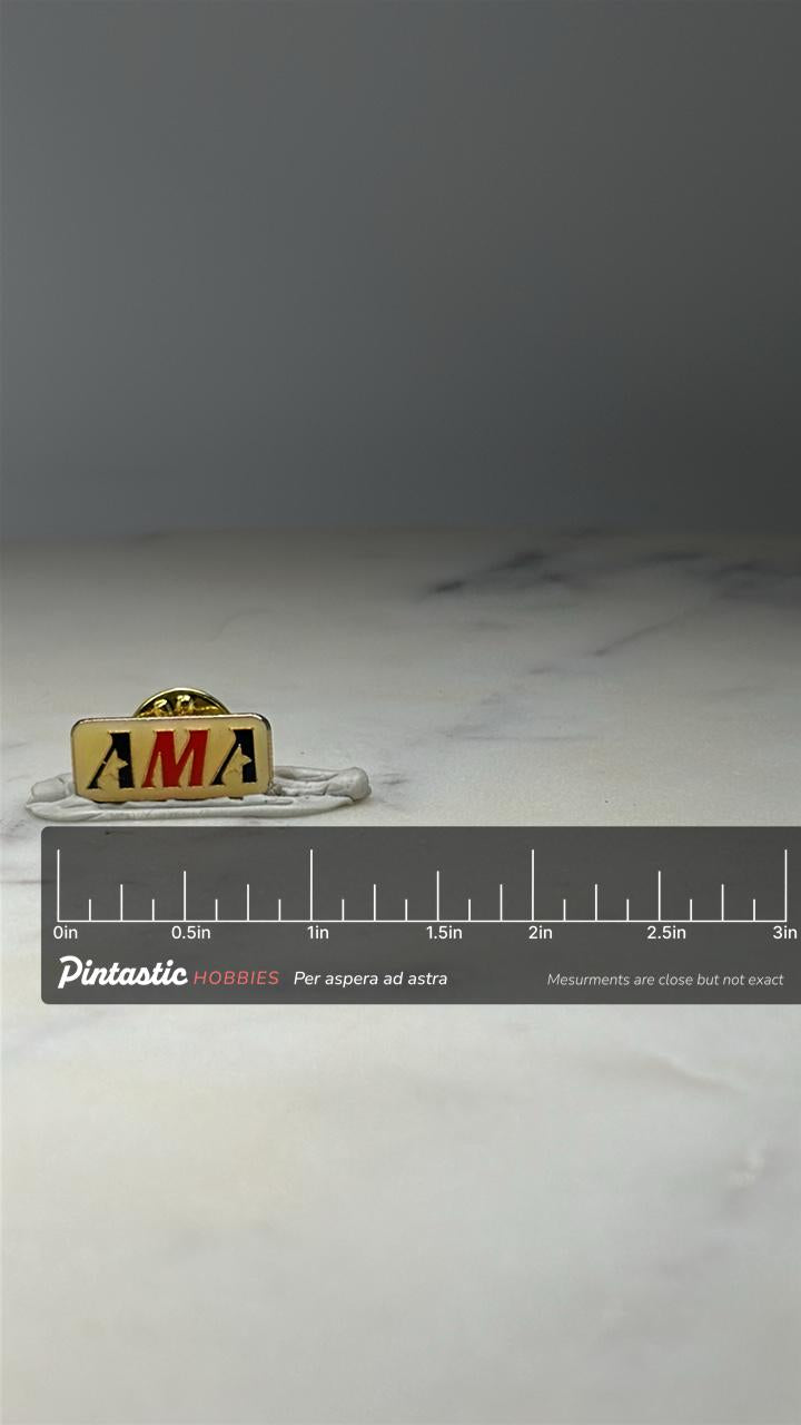 American Motorcyclist Association AMA Pin Vintage Motorcycle Enamel Lapel Pin with ruler overlay for size reference