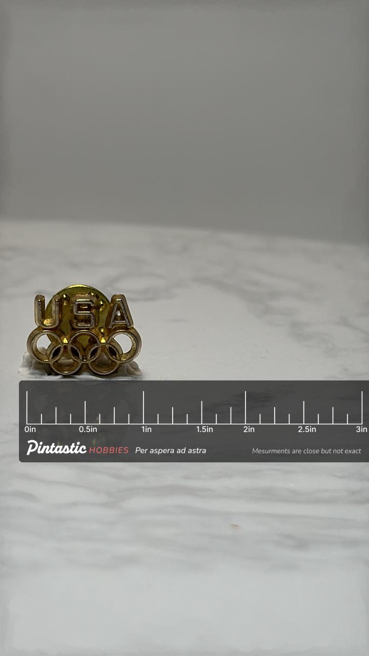 USA Olympic Pin: Gold Tone Finish - Sports Memorabilia Accessory with ruler overlay for size reference