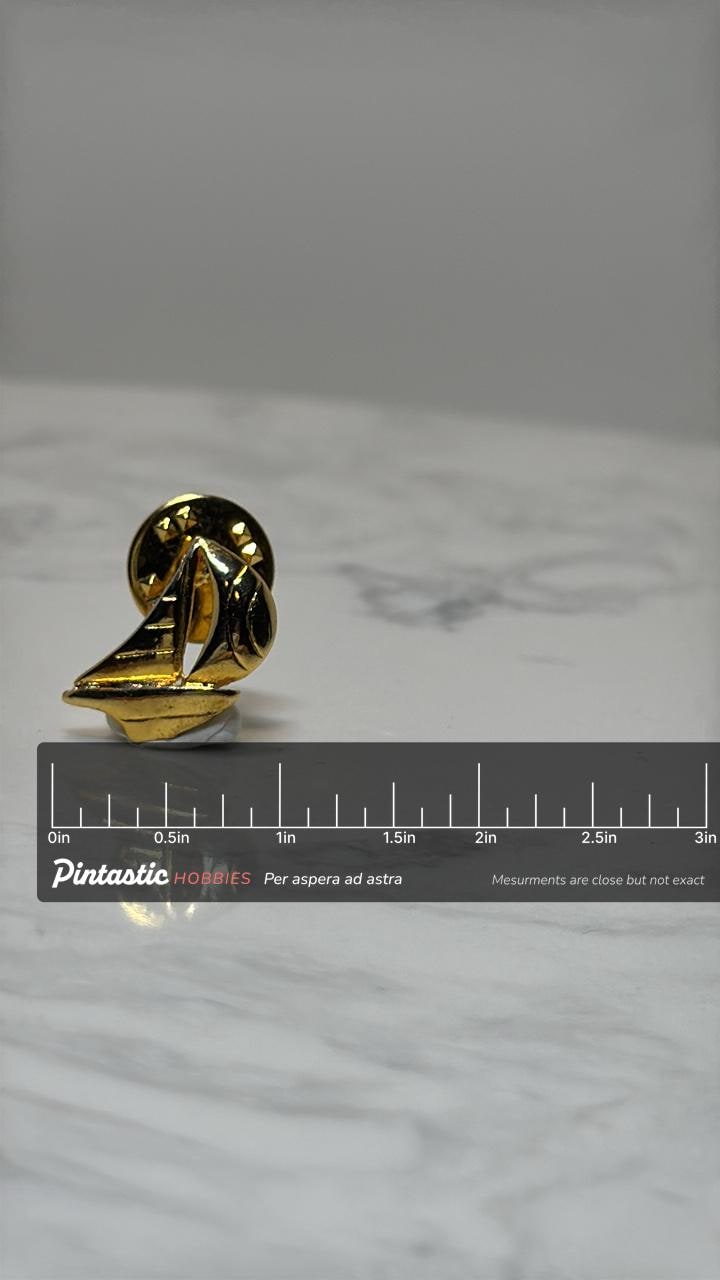 Sailboat Lapel Pin: Shiny Gold Tone - Nautical Accessory with ruler overlay for size reference
