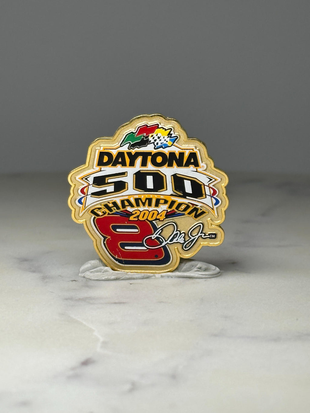 Daytona 500 Champion Pin: Gold Tone Enamel - 2004 Racing Accessory