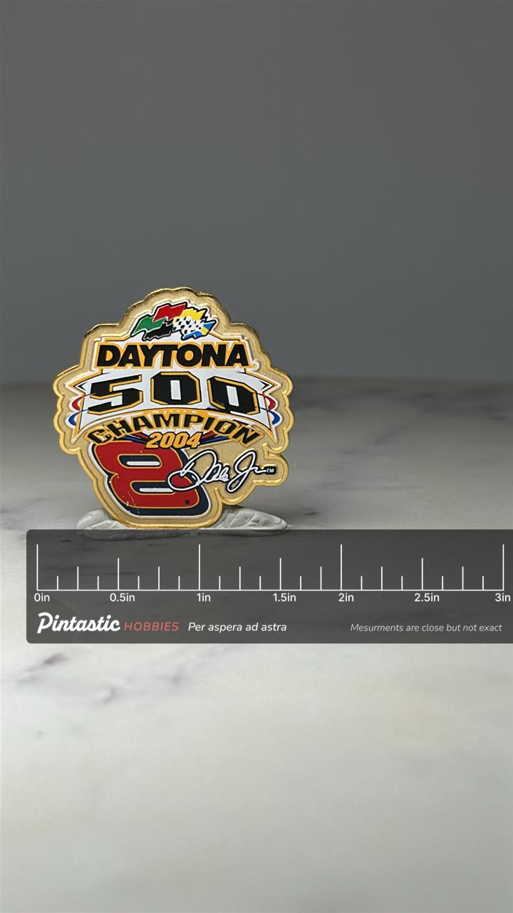 Daytona 500 Champion Pin: Gold Tone Enamel - 2004 Racing Accessory with ruler overlay for size reference