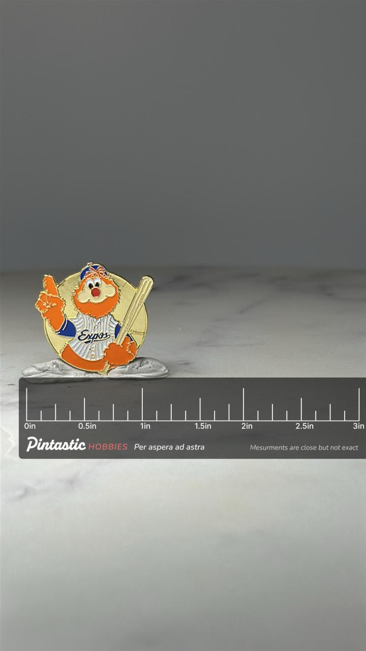 Montreal Expos Youppi Mascot Pin: Gold Tone Enamel - MLB Baseball with ruler overlay for size reference