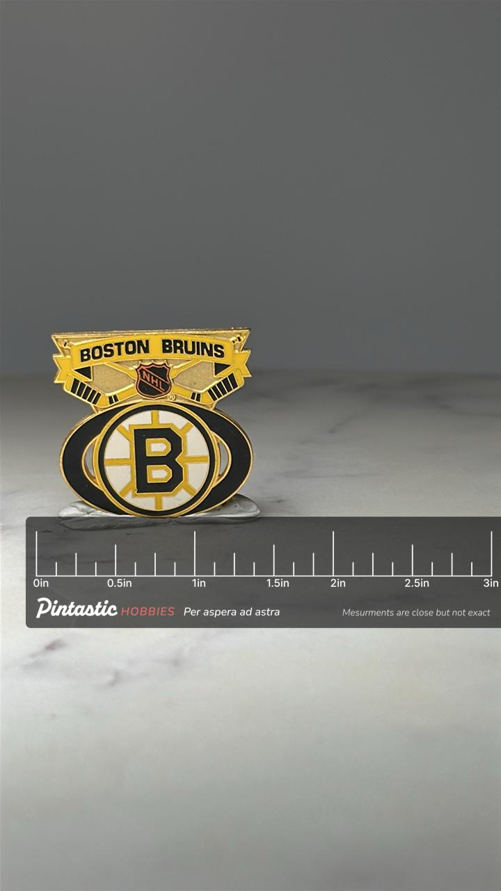 Boston Bruins Hockey Pin: Gold & Enamel - NHL Sports Accessory with ruler overlay for size reference