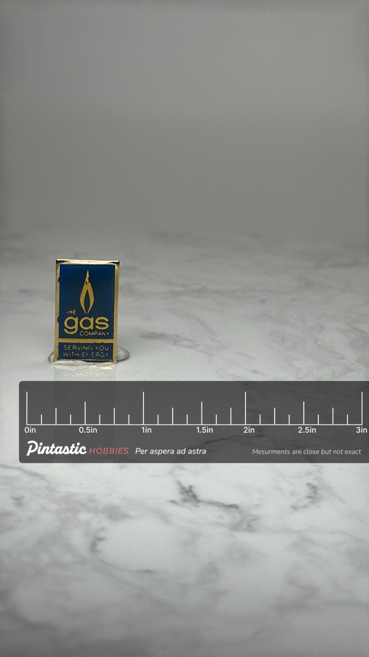The Gas Company Enamel Pin: Blue & Gold - Vintage Energy Accessory with ruler overlay for size reference