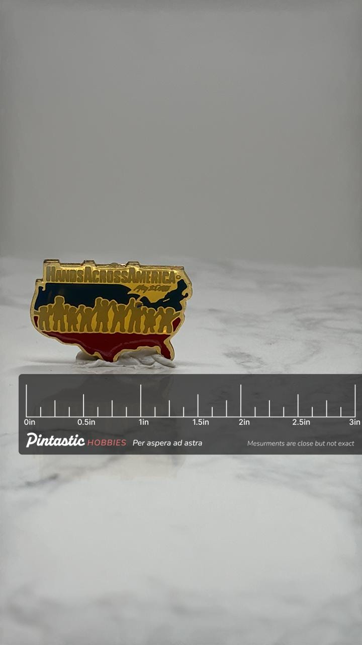 Hands Across America Enamel Pin: Red White Blue - 1986 Patriotic Accessory with ruler overlay for size reference