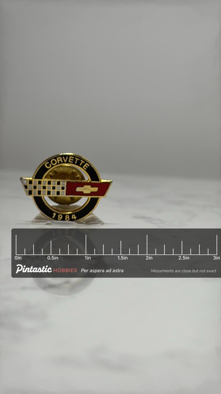 Corvette 1984 Enamel Pin: Black Red Gold - Vintage Car Accessory with ruler overlay for size reference