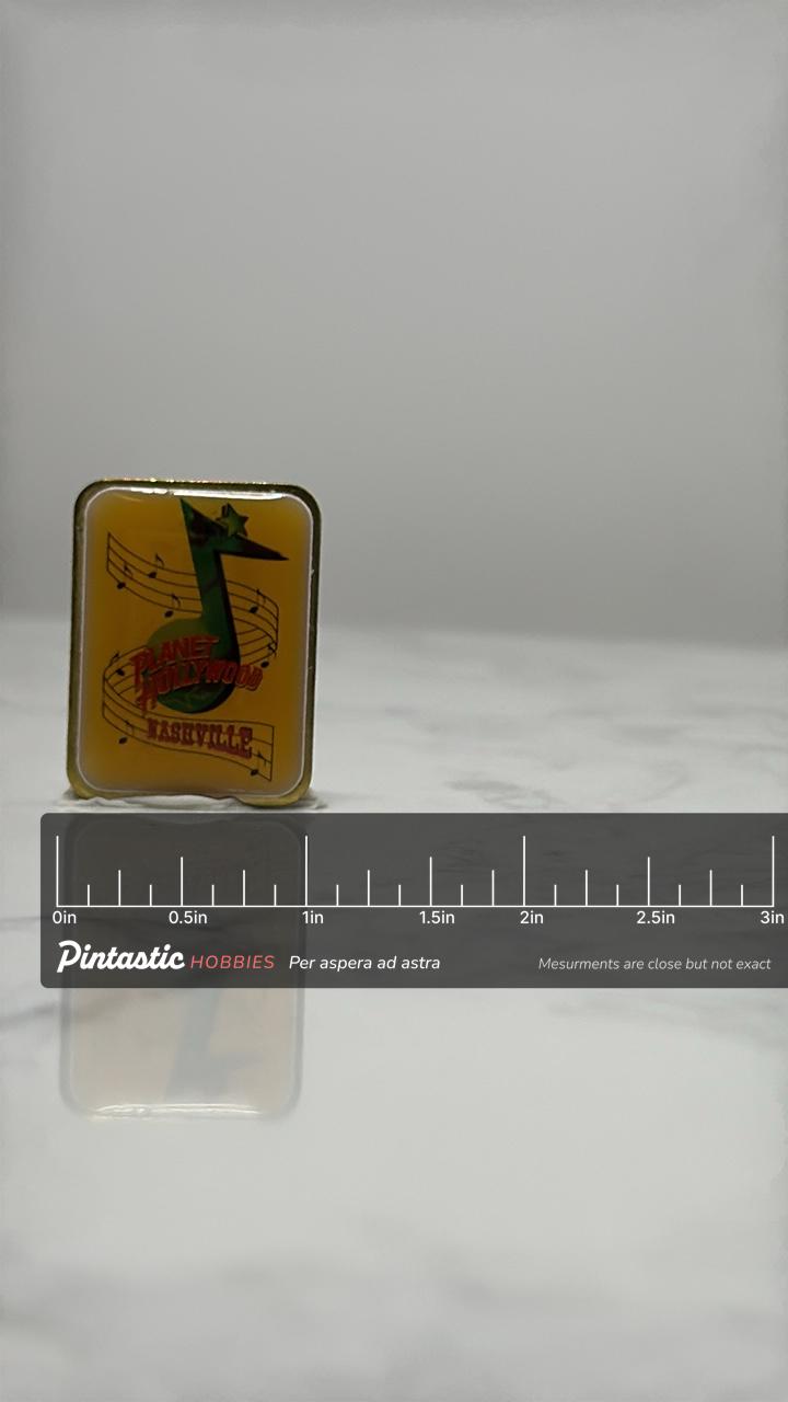 Planet Hollywood Nashville Pin: Yellow Music Note - 1990s Accessory with ruler overlay for size reference