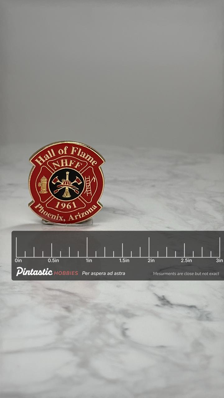 Hall of Flame Firefighting Pin: Red Enamel Gold - Phoenix AZ 1961 with ruler overlay for size reference