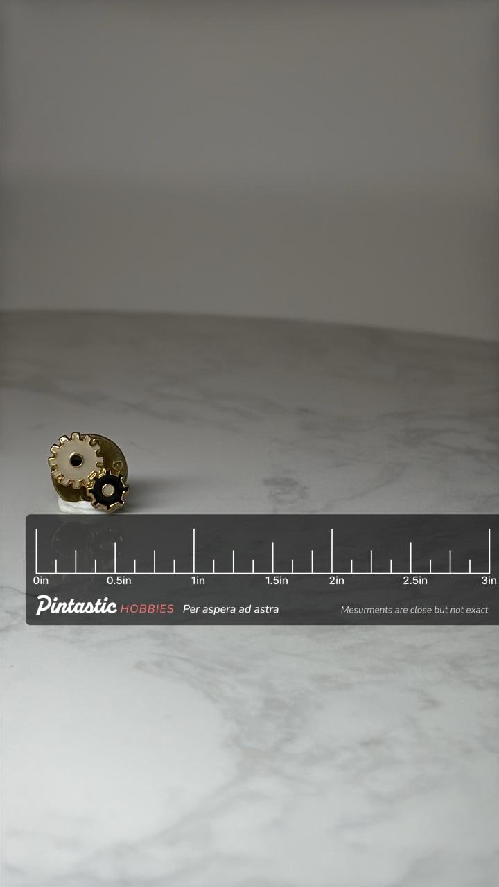 Steampunk Gear Lapel Pin: Gold Tone Metal - Industrial Era Accessory with ruler overlay for size reference