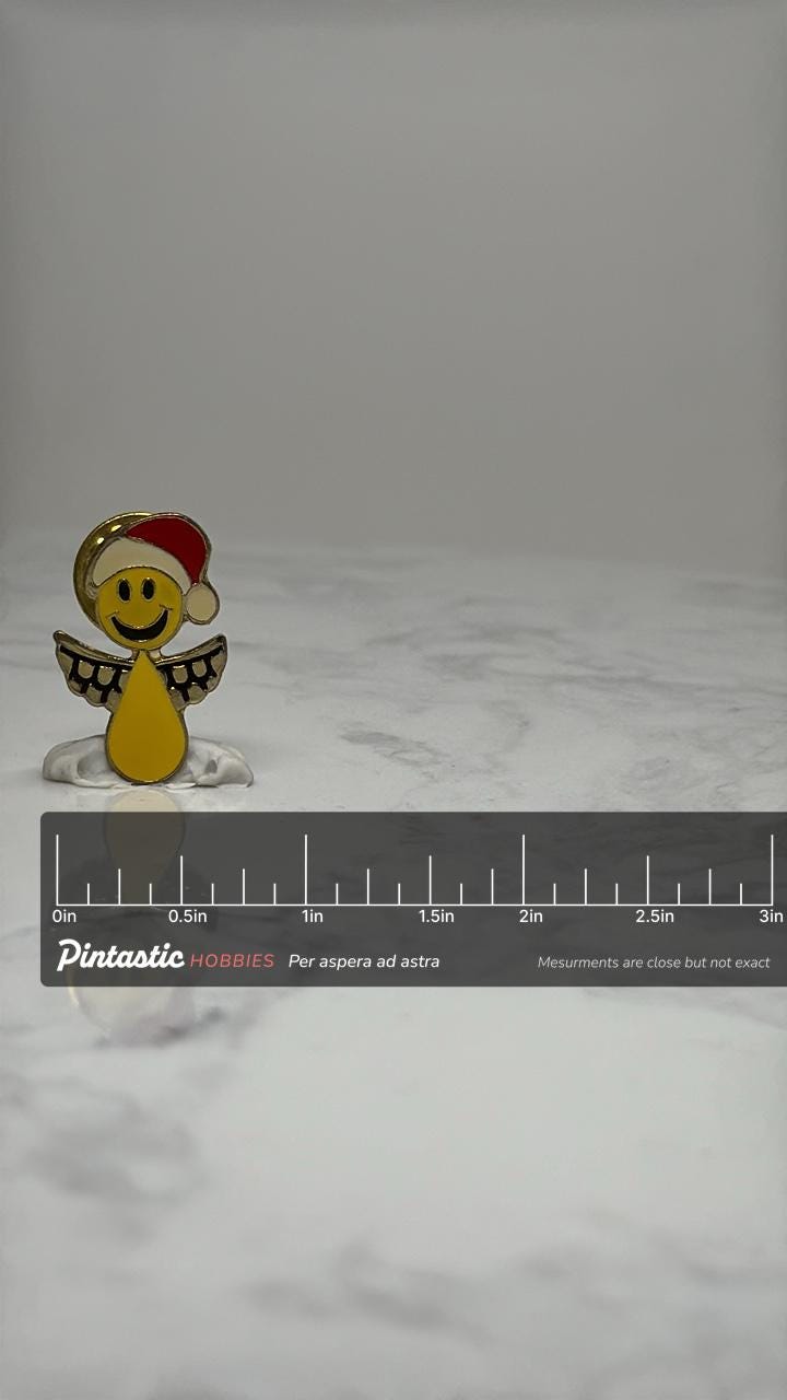 Smiley Angel Enamel Pin: Gold Tone Red Hat - Christmas Accessory with ruler overlay for size reference