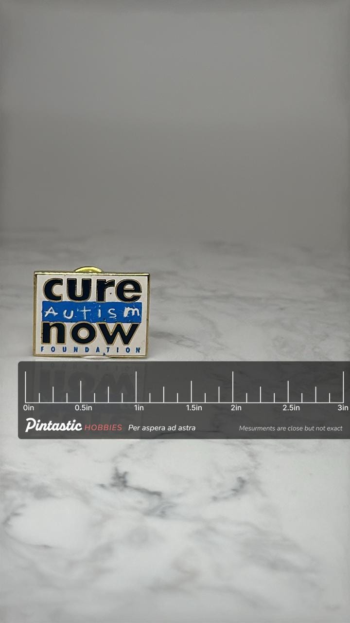 Cure Autism Now Foundation Pin: Blue White Enamel - Charity Accessory with ruler overlay for size reference