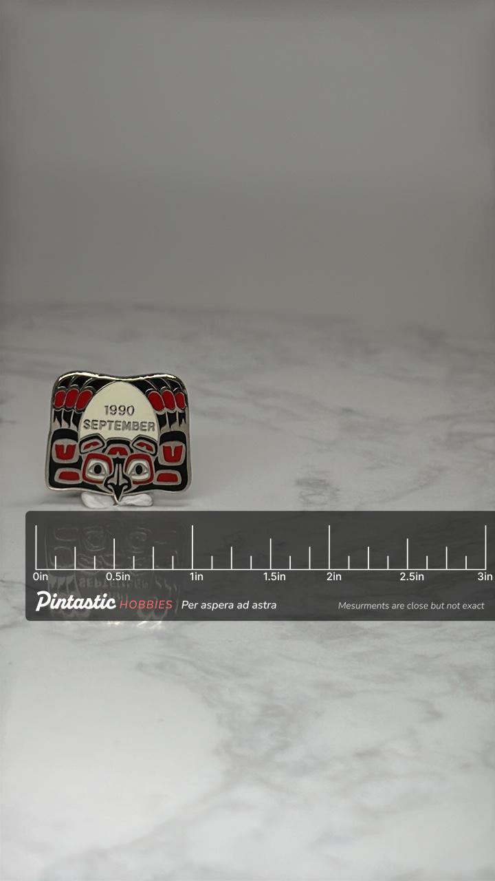 1990 September Native Commemorative Pin: Red Black Enamel - Native Art Accessory with ruler overlay for size reference