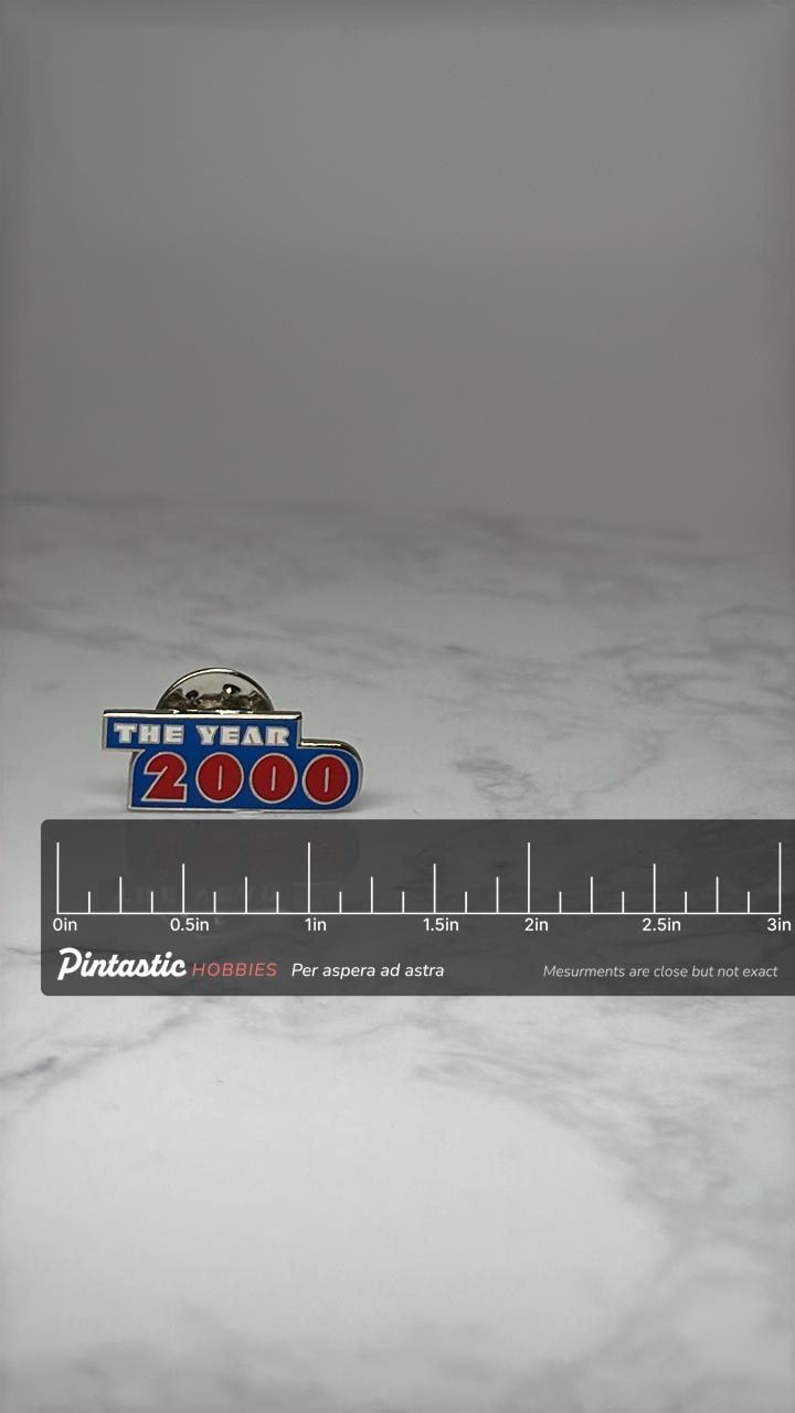 The Year 2000 Enamel Lapel Pin: Blue Red Silver - Y2K Accessory with ruler overlay for size reference