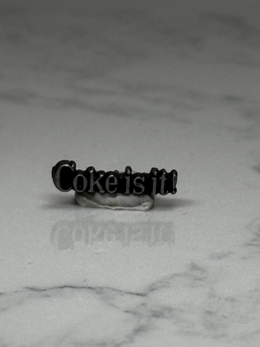 Coke is it! Slogan Pin: Black Enamel - 1980s Advertising Accessory