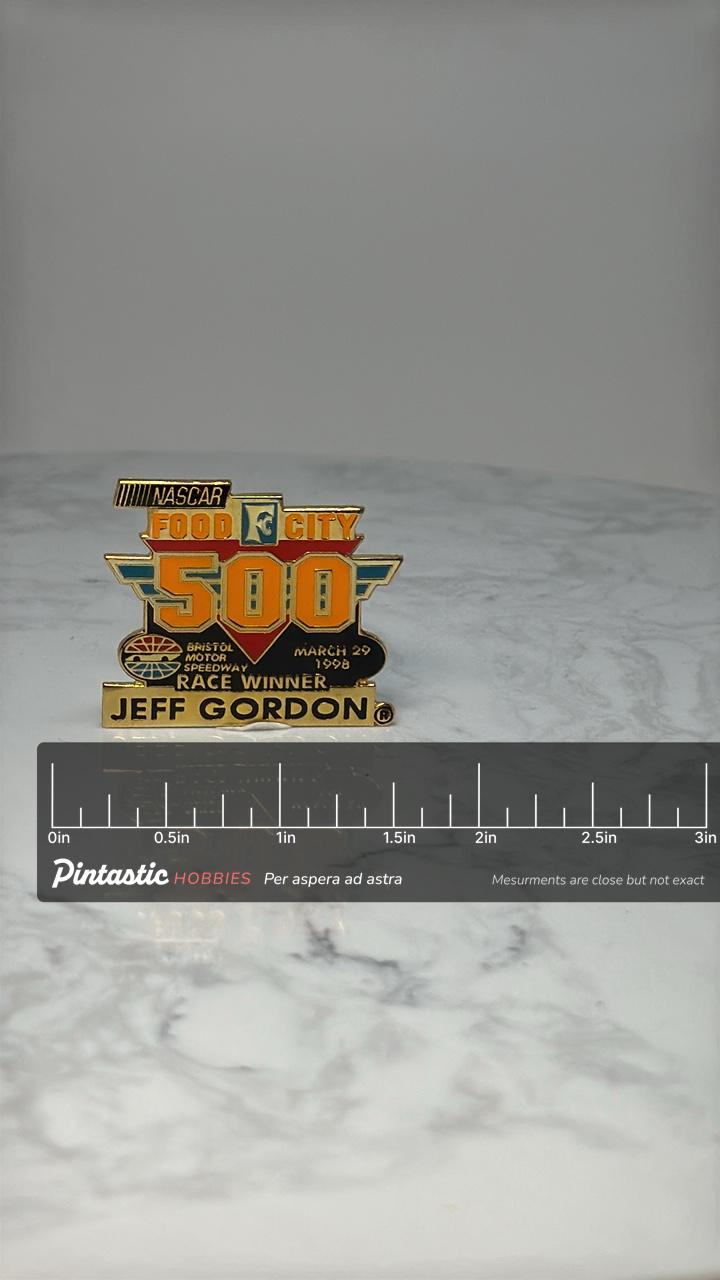 NASCAR Food City 500 Pin: Gold Tone - 1998 Race Winner with ruler overlay for size reference