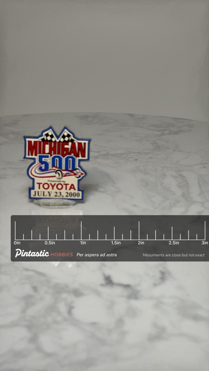 Michigan 500 Racing Pin: Red Blue Enamel - 2000 Motorsports Accessory with ruler overlay for size reference