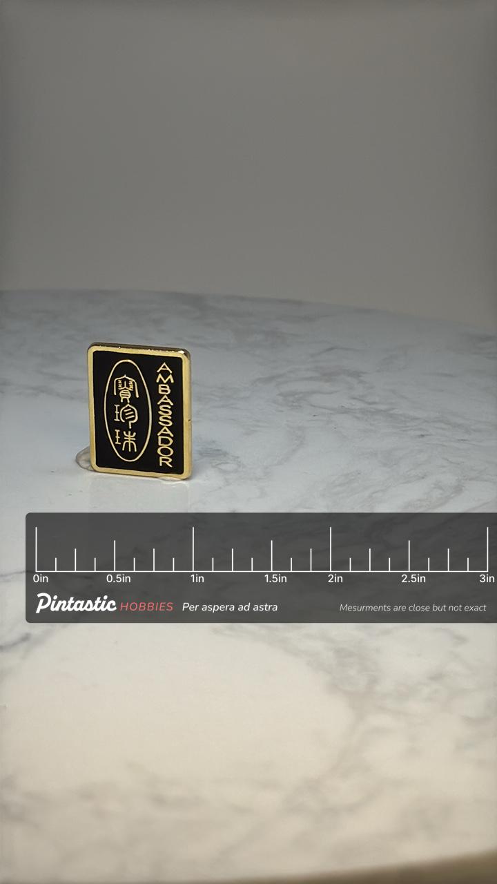 Ambassador Enamel Pin: Black & Gold - Career Accessory with ruler overlay for size reference