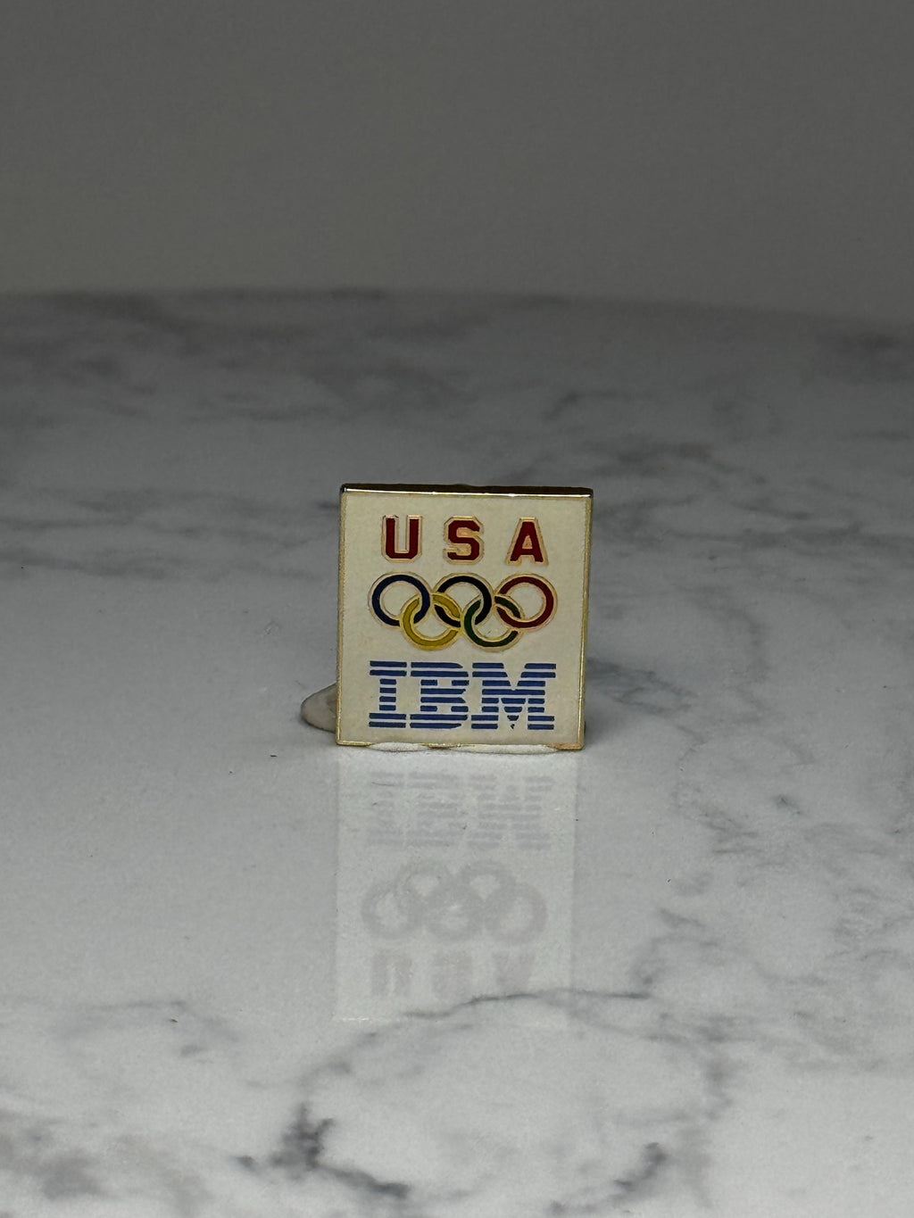 USA Olympic IBM Lapel Pin: Enamel Gold Tone - Patriotic Sports Accessory
