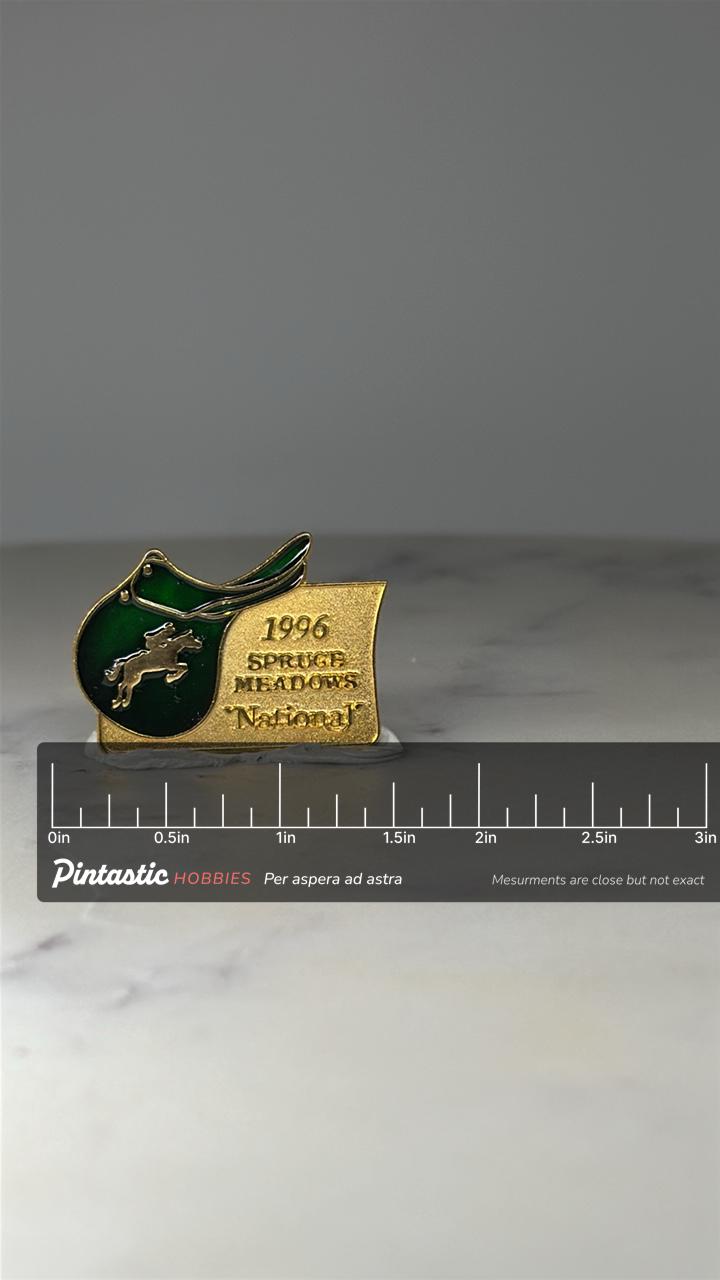 1996 Spruce Meadows National Pin: Green Gold Enamel - Equestrian Sports Accessory with ruler overlay for size reference