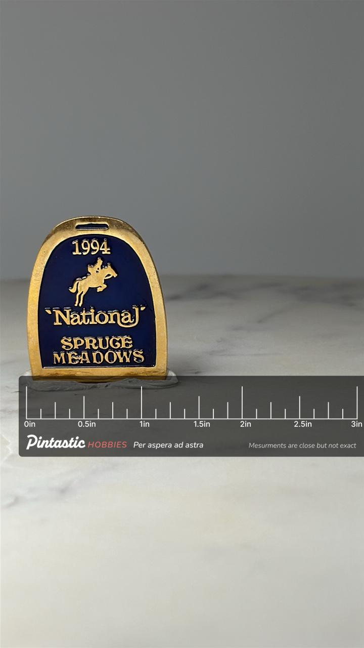 1994 National Spruce Meadows Lapel Pin: Blue & Gold Equestrian with ruler overlay for size reference