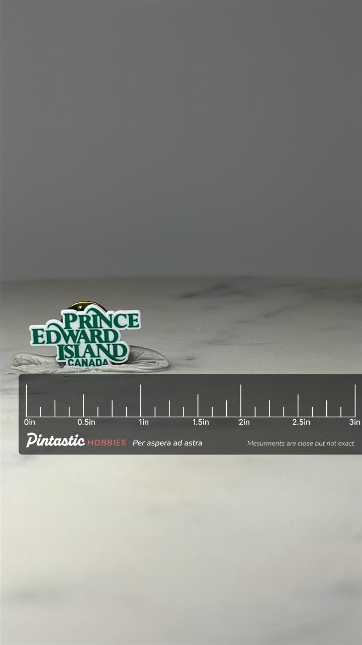 Prince Edward Island Souvenir Pin: Green & White - Canada Travel Accessory with ruler overlay for size reference