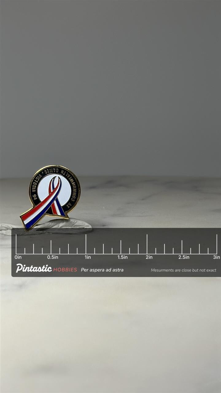 1994 XV Commonwealth Games Victoria Pin Vintage Commonwealth Games Enamel Lapel Pin with ruler overlay for size reference