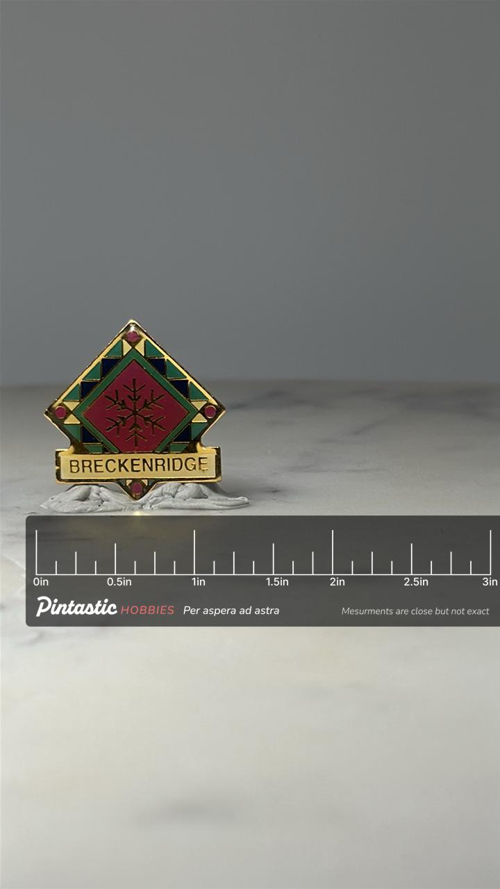 Breckenridge Colorado Souvenir Pin: Enamel Snowflake - Ski Town Accessory with ruler overlay for size reference