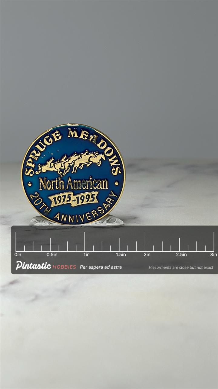 Spruce Meadows North American Pin: Blue Enamel - 20th Anniversary with ruler overlay for size reference