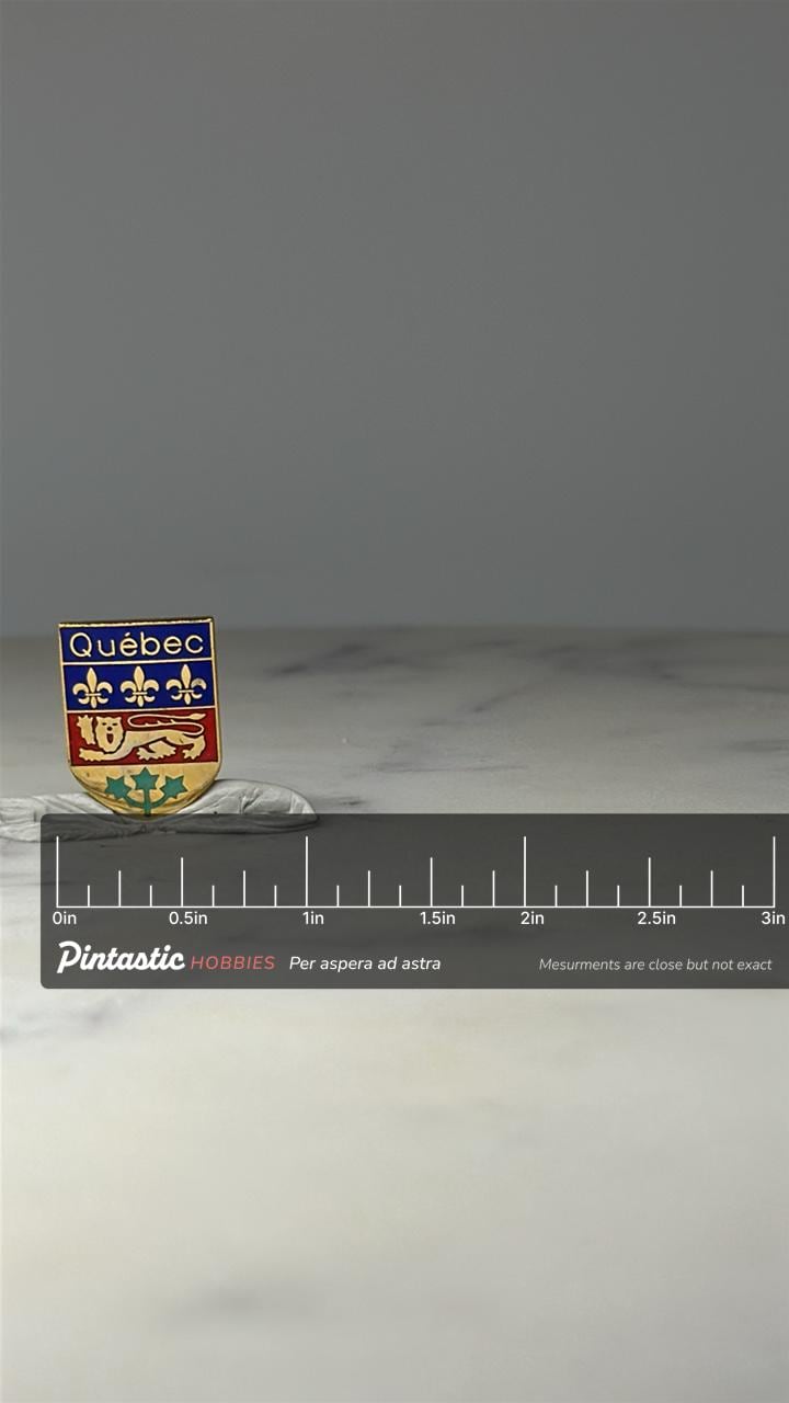 Quebec Canada Shield Enamel Pin: Blue Red Gold - Travel Souvenir with ruler overlay for size reference