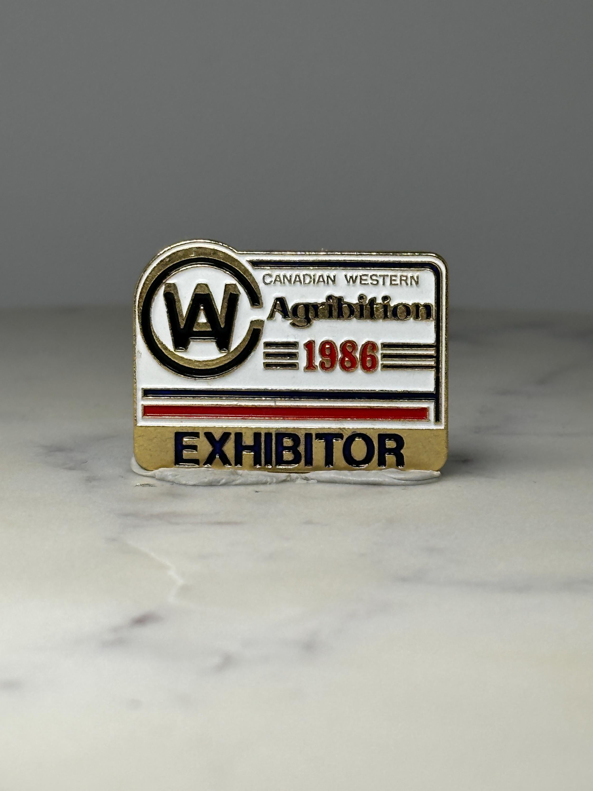 Canadian Western Agribition Pin: Gold Enamel - 1986 Exhibitor