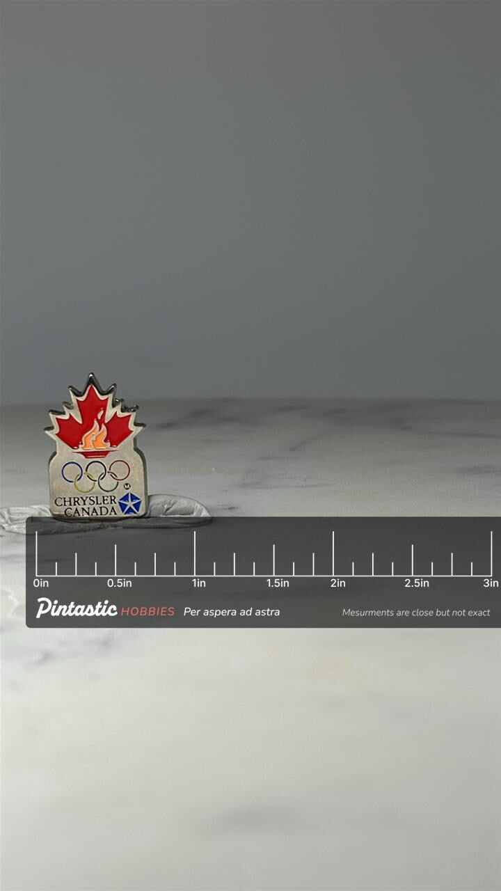 Chrysler Canada Olympic Pin: Red Maple Leaf Enamel - 1988 Sponsor with ruler overlay for size reference